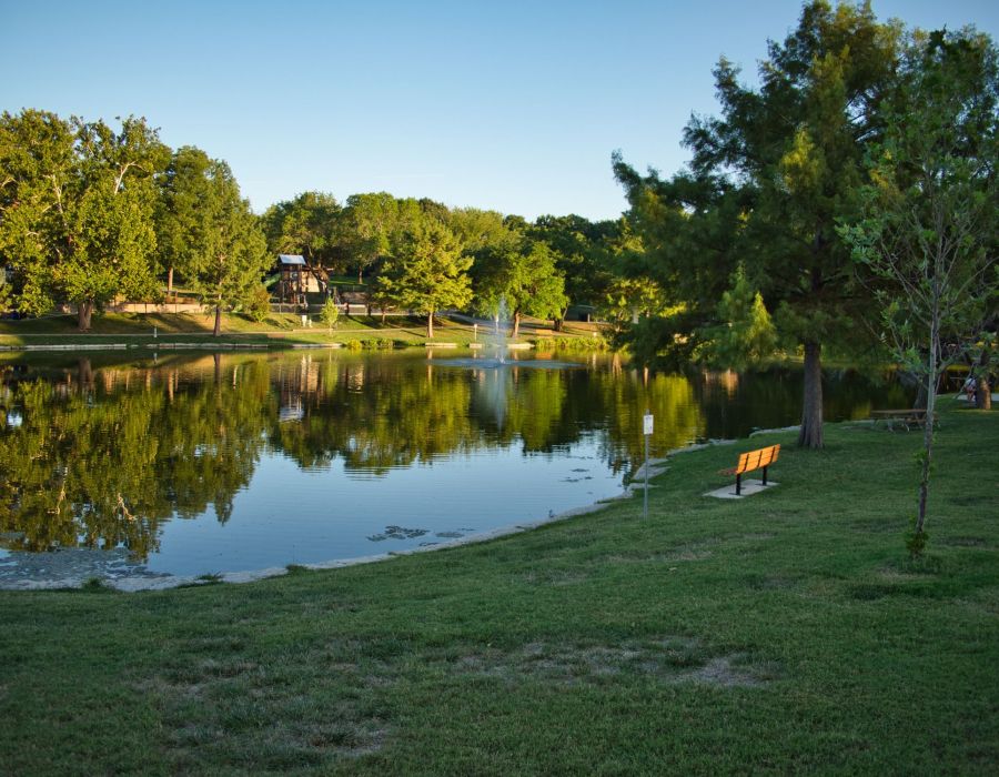 Fountain Spraying into Reflective Waters at Sar Ko Par Park in Lenexa Kansas