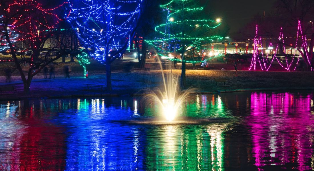 Holiday Christmas Lights at Sar Ko Park Park in Lenexa Kansas reflecting in water